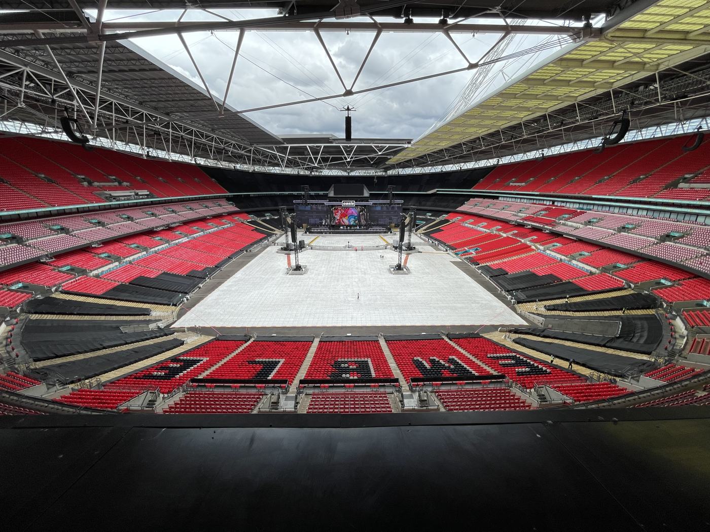 Wembley bowl looking toward the stage, WEMBLEY spelled in the seats